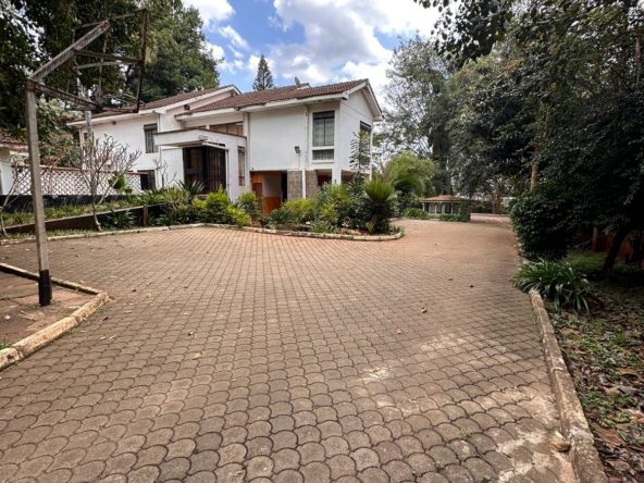 1 Acre prime plot for sale in Lavington, Nairobi. Contains a 5 bedroom house in good condition. Surrounded by mature trees. Price: $2.5 Million Musilli Homes