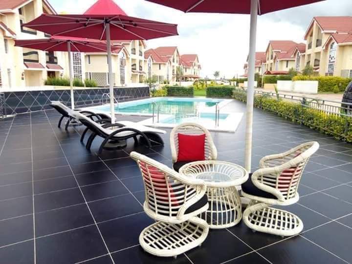 5br all ensuite townhouse plus dsq in kitengela. Royal finnese estate. Has Communal pool with clubhouse and gym. Musilli Homes Pam Golding
