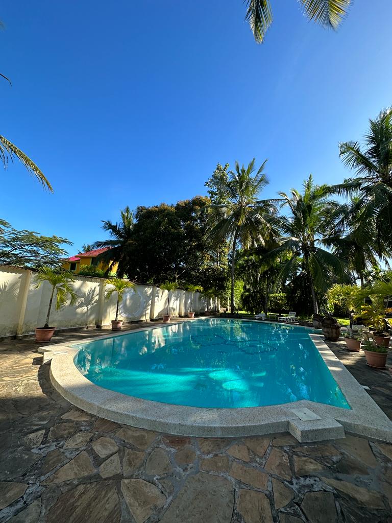 3 bedroom villa plus a guest wing for sale in Diani. Sitting on 1/2 acre for sale near Neptune beach Resort. Ksh 45Million negotiable Musilli Homes