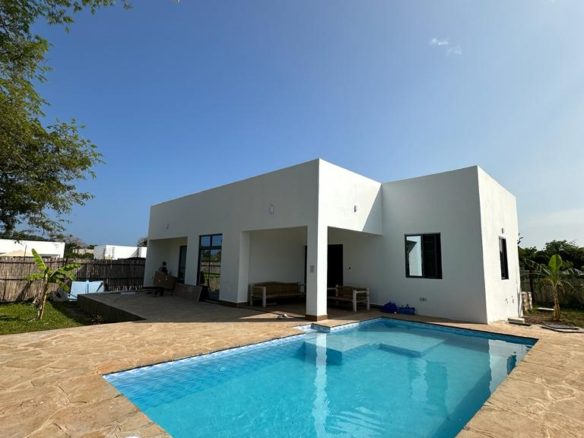 3 bedroom holiday homes for sale in Diani near Neptune Beach. Front yard garden Swimming pool. Rooftop access. Ksh 18million Musilli Homes