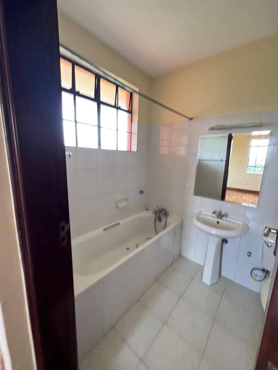 3 Bedroom Apartment Plus DSQ For rent with swimming pool, kids playing area, and borehole. Rent Per month : Ksh 90000