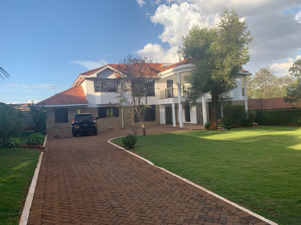 Exquisite 4 Bedroom Townhouse For Sale in Karen with a well manicured garden, ample parking and in a gated community. Asking Price. 77M. Musilli Homes.