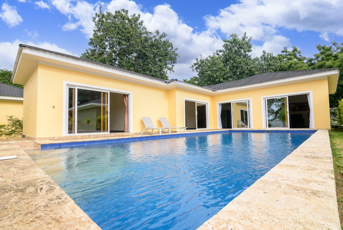 Modern 2 Bedroom Villa For Sale in Malindi in a gated community, has a private swimming pool, garden, gazebo and a BBQ area. Asking Price: 27M. Musilli Homes.
