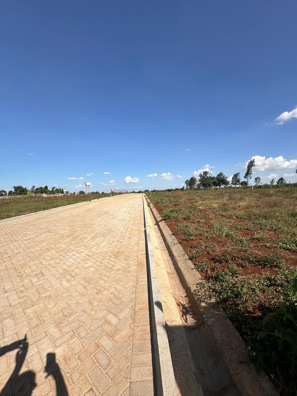 Scenic Prime Land For Sale in Runda. Located in a gated community, with a cabro paved driveway and a ready title deed. Asking Price. 40 M. Musilli Homes.