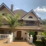 Spacious 4 Bedroom Townhouse For Sale in Runda with a modern kitchen, gazebo, manicured lawn and electric fence. Asking Price. 120 M. Musilli Homes.