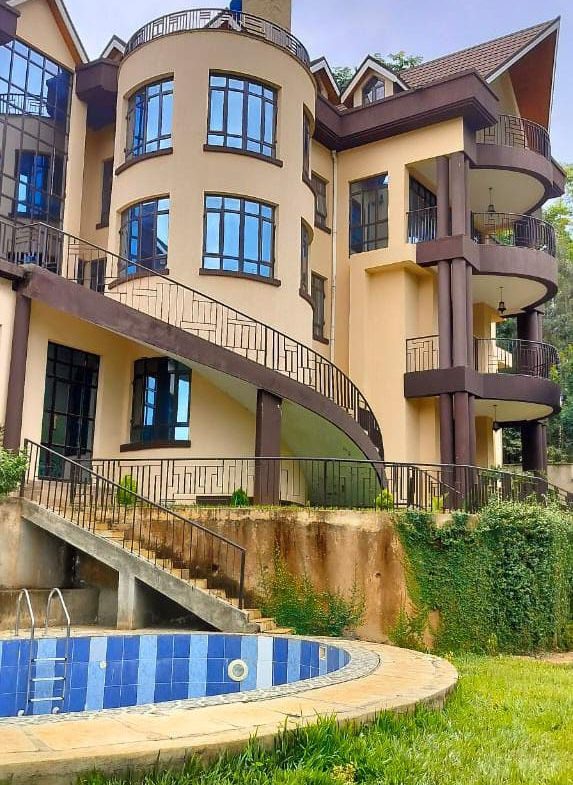 Ultra-Modern 9 Bedroom House For Sale in Nyari. Has a swimming pool, ample parking, 24/7 security, and a manicured garden.Asking Price: 210M. Musilli Homes.