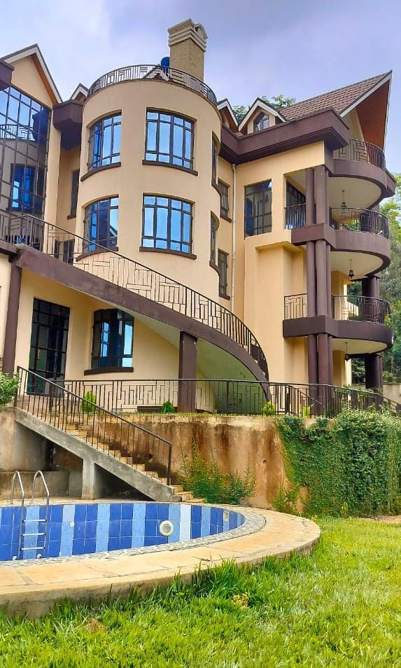Ultra-Modern 9 Bedroom House For Sale in Nyari. Has a swimming pool, ample parking, 24/7 security, and a manicured garden.Asking Price: 210M. Musilli Homes.