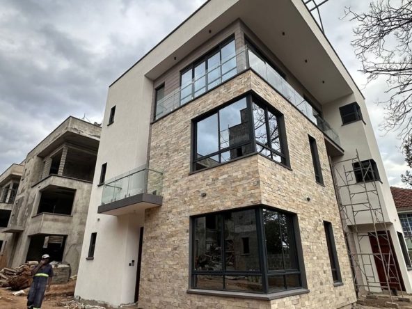 Modern 4 Bedroom Townhouse For Sale in Lavington. Has CCTV, backup generator, a garden, and ample parking. Asking Price: 78M.Musilli Homes.