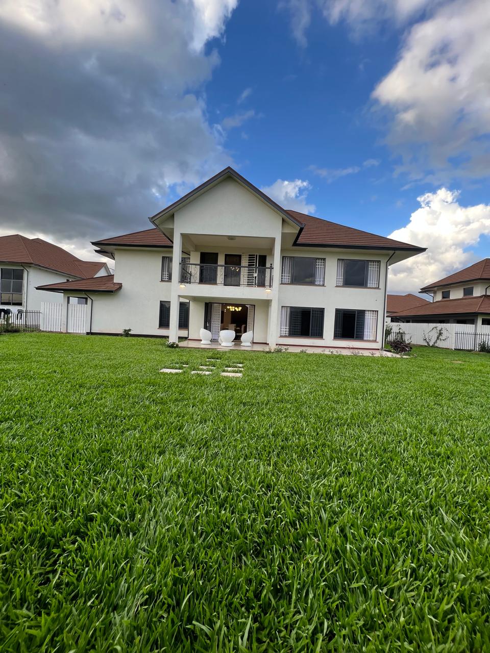 Modern 4 Bedroom Villa For Sale in Runda. In a gated community, has all bedroom ensuite, and sit on 1/4 Acre land. Asking price: 88M. Musilli Homes.