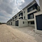Modern 4 and 6 Bedroom Townhouses Plus DSQ for sale in South C. Has a Closed kitchen plan fitted with a cook, and oven. Asking price: 38M. Musilli Homes.