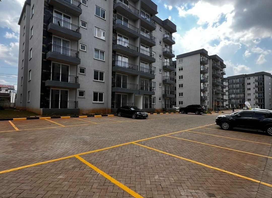 Modern 2 Bedroom Apartment for Rent and Sale in Syokimau with master bedroom ensuite, spacious living area, laundry area, ample parking and good security. Asking price: Ksh 7.5M. Musilli Homes.