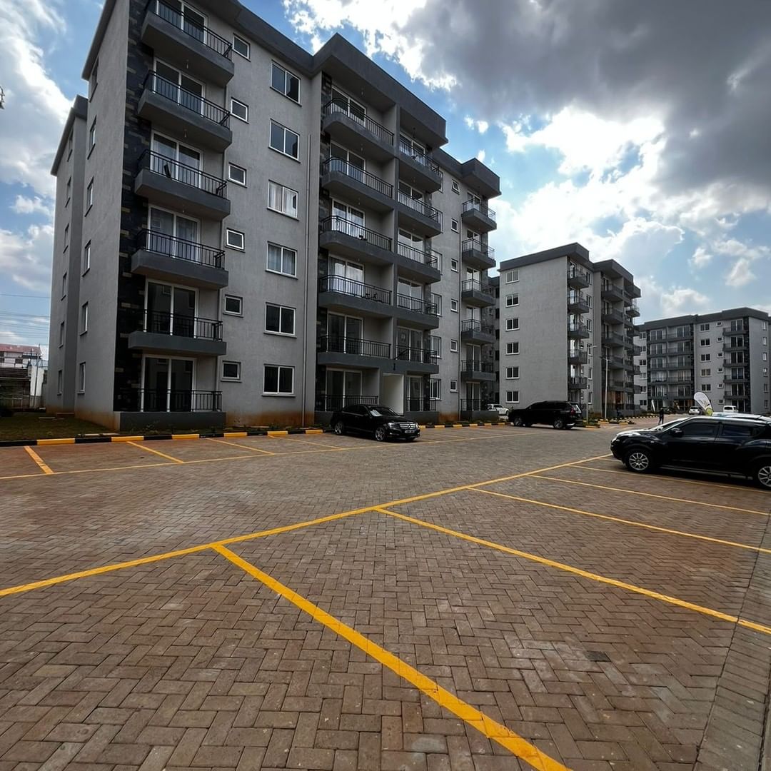 Modern 2 Bedroom Apartment for Rent and Sale in Syokimau with master bedroom ensuite, spacious living area, laundry area, ample parking and good security. Asking price: Ksh 7.5M. Musilli Homes.