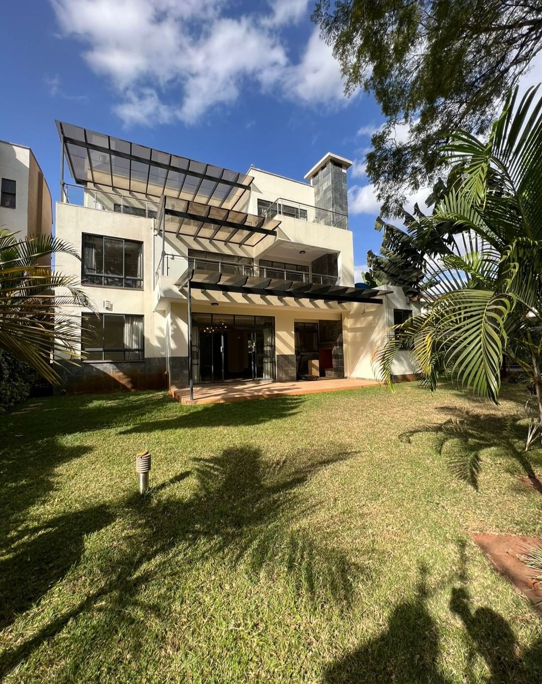 Modern 5 Bedroom Plus DSQ Townhouse For Sale in Lavington with modern finishing, in a gated community, ample parking, and swimming poool.Sale price: Ksh 100M.