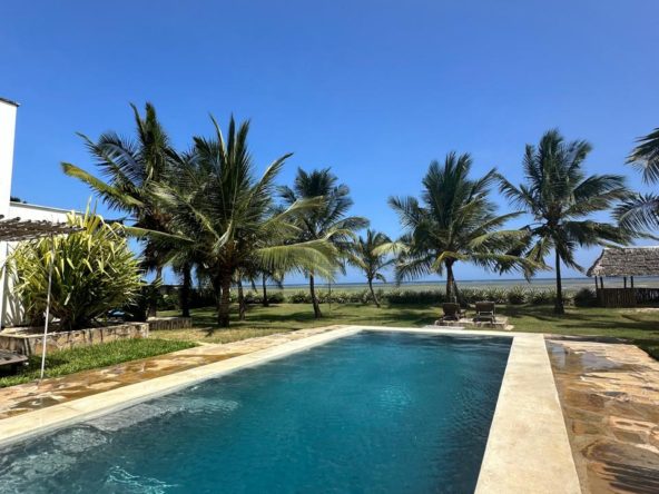 Modern 2 Bedroom Beachfront Apartment for Sale. Has a master ensuite, balcony, fully furnished and has a private beach access. Sale price: Ksh 25M. Musilli Homes