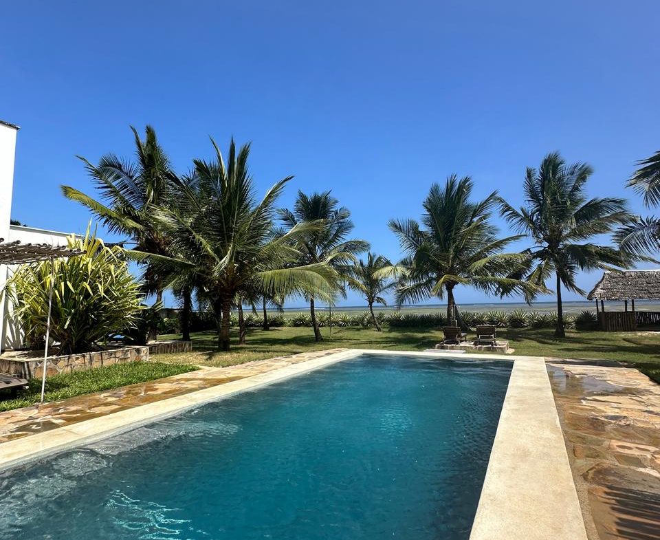 Modern 2 Bedroom Beachfront Apartment for Sale. Has a master ensuite, balcony, fully furnished and has a private beach access. Sale price: Ksh 25M. Musilli Homes